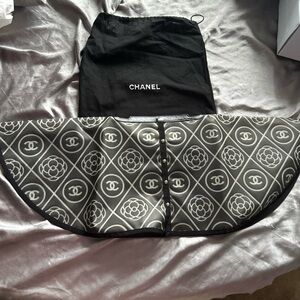 CHANEL Black and White handbag raincoat